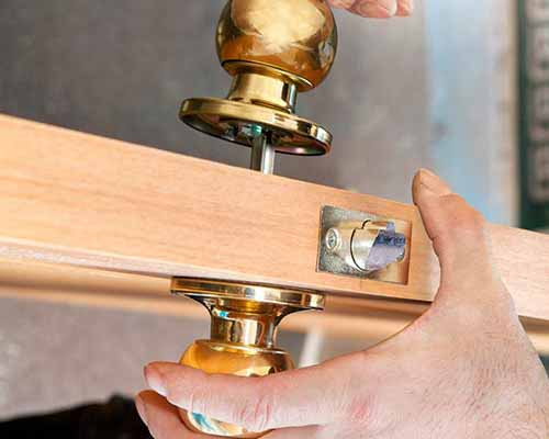 Home lock rekeying by professional locksmith